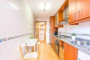 Kuchnia lub aneks kuchenny w obiekcie Altorreal - Más que apartamentos