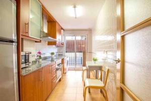 Kuchnia lub aneks kuchenny w obiekcie Altorreal - Más que apartamentos