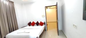 Postel nebo postele na pokoji v ubytování PALM Beach Resort, Alleppey
