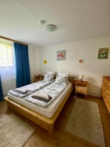 Postel nebo postele na pokoji v ubytování Tannenhof Apartment