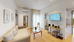 TV a/nebo společenská místnost v ubytování Maritime Suites