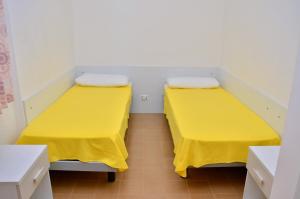 A bed or beds in a room at Condominio Sovego