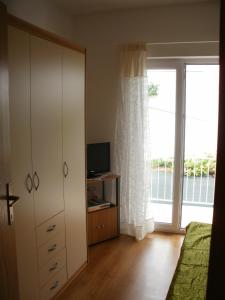 Et tv og/eller underholdning på Apartments Renko