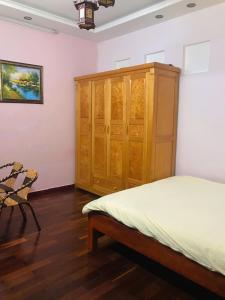 Postel nebo postele na pokoji v ubytování Yumie house
