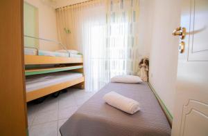Ένα ή περισσότερα κρεβάτια σε δωμάτιο στο Isthmus luxury apartment