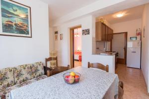 Kuchyň nebo kuchyňský kout v ubytování Apartments Marija