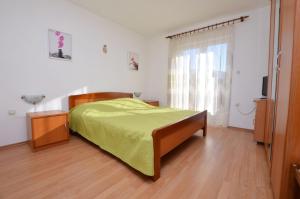 Postel nebo postele na pokoji v ubytování Apartments Marija