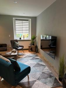 Ein Sitzbereich in der Unterkunft Apartmány Klicperka