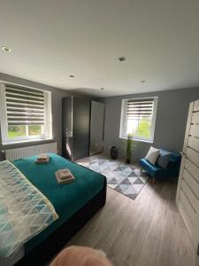 Ein Bett oder Betten in einem Zimmer der Unterkunft Apartmány Klicperka