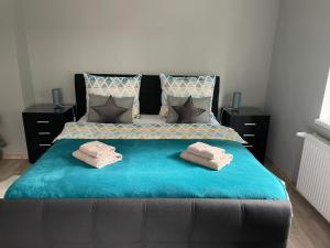 Ein Bett oder Betten in einem Zimmer der Unterkunft Apartmány Klicperka