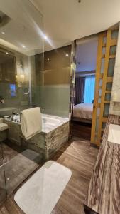 Postel nebo postele na pokoji v ubytování JW Marriott Hotel Chandigarh