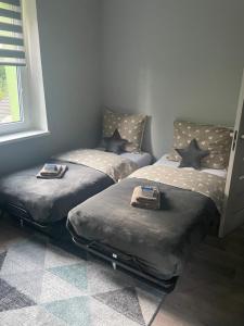 Ein Bett oder Betten in einem Zimmer der Unterkunft Apartmány Klicperka
