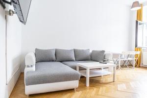 A seating area at Near Danube & Millenium Tower - Massive Shared 4BR Apt