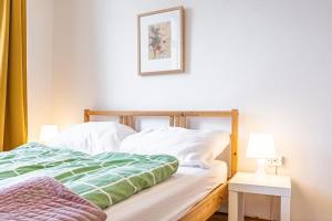 A bed or beds in a room at Near Danube & Millenium Tower - Massive Shared 4BR Apt