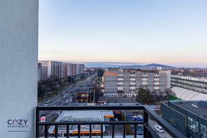 a view of a city from a building at Luxury Residences & Suites in Central Brasov at Coresi Mall in Braşov