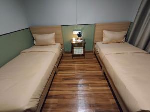 Postel nebo postele na pokoji v ubytování The Aurum Motel - self check-in -