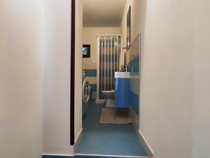 a bathroom with a toilet and a sink at Baia delle Sirene by Holiday World in Porticello