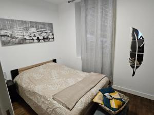 Postel nebo postele na pokoji v ubytování T2 cosy