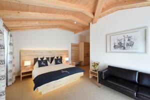 Postel nebo postele na pokoji v ubytování Hotel Cervo + 37 fotografií