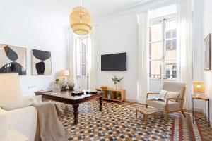 TV a/nebo společenská místnost v ubytování Genteel Home Larios