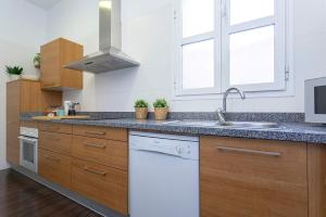 Kuchyň nebo kuchyňský kout v ubytování Genteel Home Larios