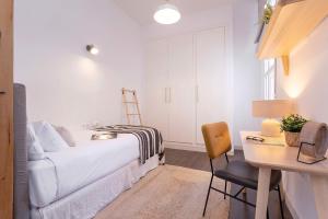 Posteľ alebo postele v izbe v ubytovaní Genteel Home Larios