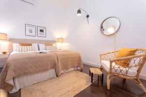 Posteľ alebo postele v izbe v ubytovaní Genteel Home Larios