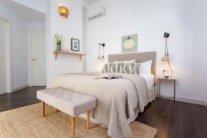 Posteľ alebo postele v izbe v ubytovaní Genteel Home Larios