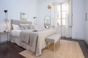 Posteľ alebo postele v izbe v ubytovaní Genteel Home Larios