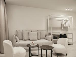 Posezení v ubytování Doryssa Method Hotel