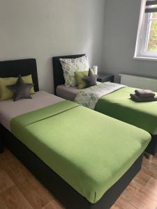 Ein Bett oder Betten in einem Zimmer der Unterkunft Apartmány Klicperka