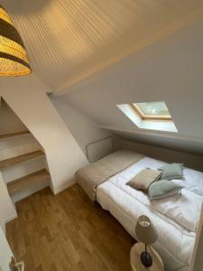 Postel nebo postele na pokoji v ubytování Maison de ville - près de LILLE + 4 fotografie