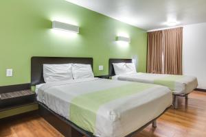 Postel nebo postele na pokoji v ubytování Motel 6-Longview, TX - North