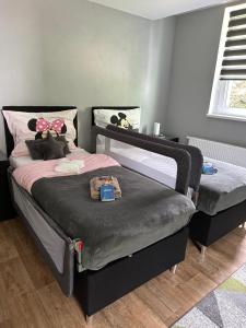 Ein Bett oder Betten in einem Zimmer der Unterkunft Apartmány Klicperka