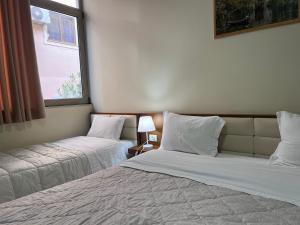 Bobi Hotelにあるベッド