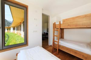 Postel nebo postele na pokoji v ubytování Camping Zögghof