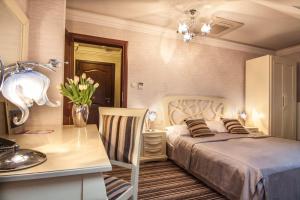 Posteľ alebo postele v izbe v ubytovaní Hotel Fajkier