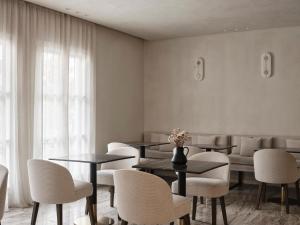 Posezení v ubytování Doryssa Method Hotel