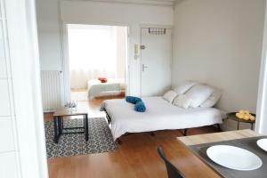 Posezení v ubytování Bel appartement très lumineux