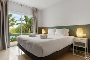 Voodi või voodid majutusasutuse ViVi Homes - Casa Sereno Pool, Terrace & Garden toas