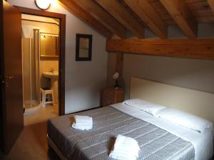 Postel nebo postele na pokoji v ubytování Casa Guigas