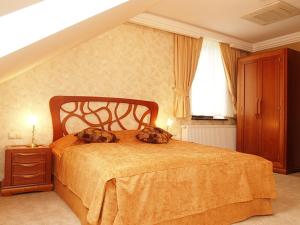Posteľ alebo postele v izbe v ubytovaní Hotel Fajkier