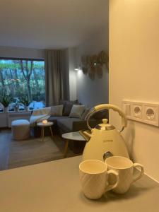 Posezení v ubytování Ground floor 2-bedrooms, 2-bathrooms apartment near Bansko in a complex with pools and SPA included