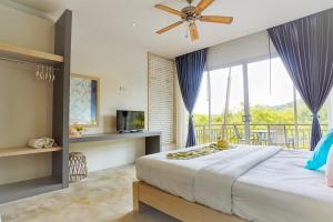 Postel nebo postele na pokoji v ubytování Ko Lanta Amantra Lake View Resort