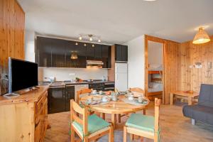 Kuchyň nebo kuchyňský kout v ubytování Appartamento Bellevue Richardette - Happy Rentals