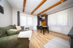 Posezení v ubytování River ApartHouse Zakopane