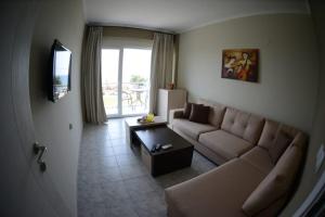 Χώρος καθιστικού στο Crown Hotel by Diomedes Group