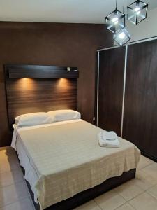 En eller flere senge i et værelse på Rooftop Velez Sarsfield