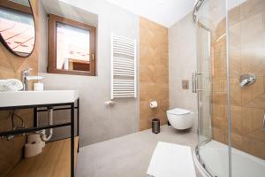 Koupelna v ubytování River ApartHouse Zakopane