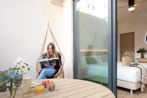 Postel nebo postele na pokoji v ubytování Nomad Haux Mestalla